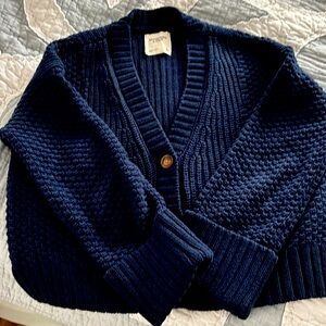Cropped cable knit cardigan